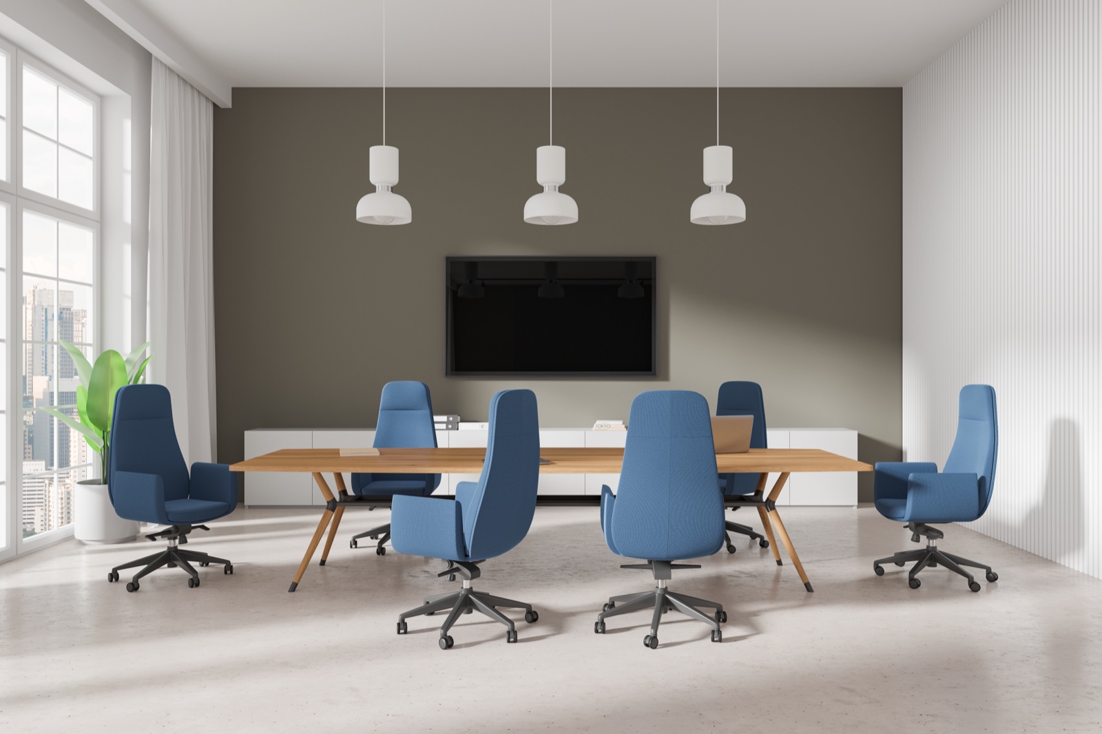 Sala riunioni moderna con tavolo in legno e sedute blu: uno degli ambienti progettabili con Makhymo Arredi